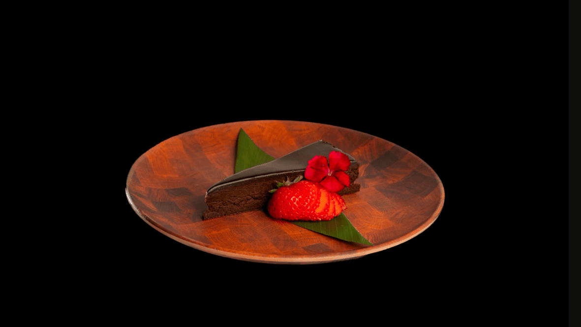 Rich Dark Chocolate Torte with a Bright Raspberry Coulis