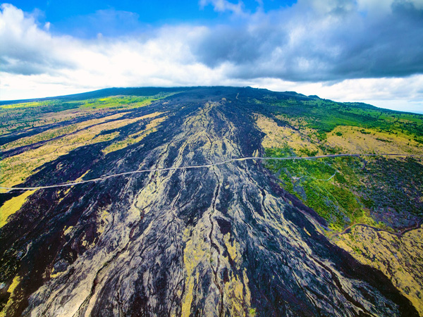Hualālai volcano landscape from the air on the Big Island, lava fields and ridges