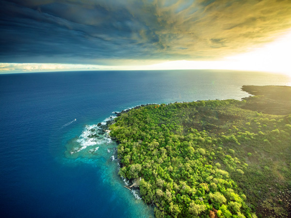 Aerial view of the Kona Coast on the Big Island, cliffs and blue water