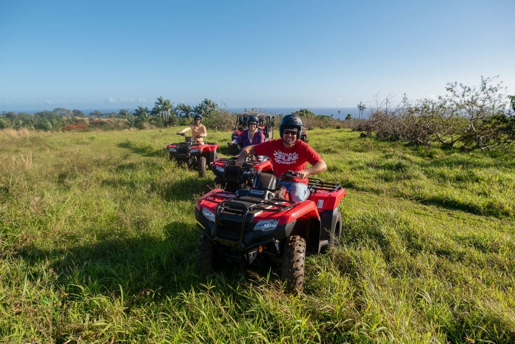 Big Island ATV tour at Umauma Experience exploring rugged trails, open pastures, and tropical terrain