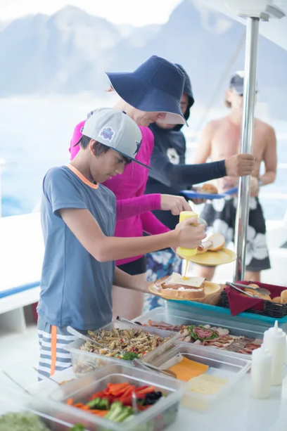 Buffet lunch served onboard during the Na Pali Coast snorkel sail