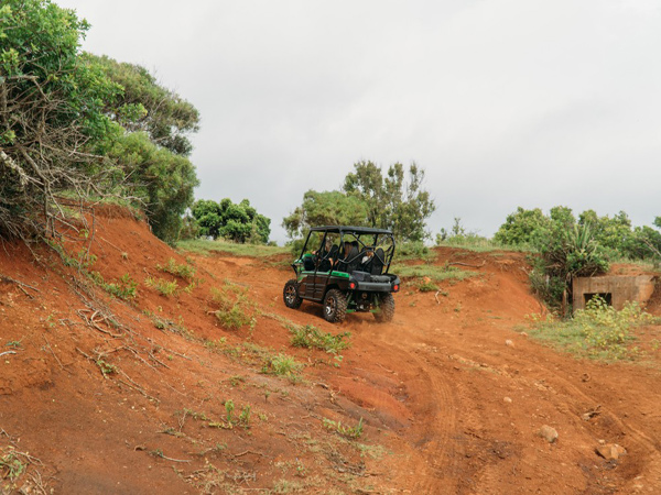 Off-road driving at Gunstock Ranch on Oahu with a UTV ride across dirt tracks and scenic ranch landscapes