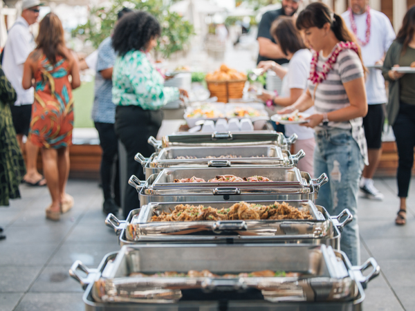 Hawaiian-style luau buffet with local dishes at Paʻina Waikiki