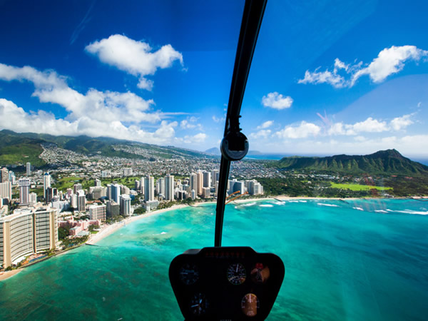 Path to Pali Passage helicopter tour showcasing lush valleys and sheer sea cliffs on Oahu