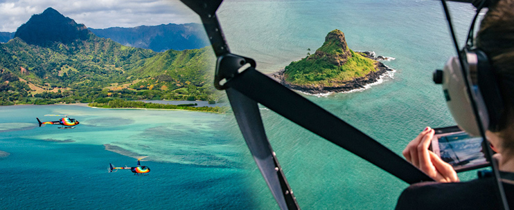 Aerial view of Oahu’s coastline and cityscape from a scenic helicopter flight