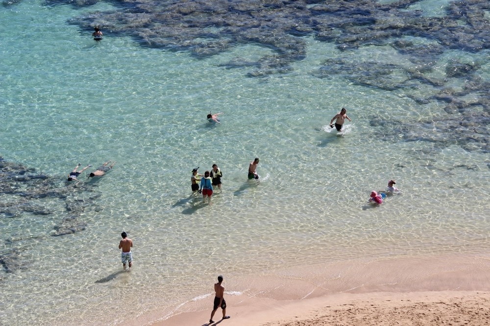 Hanauma Bay Nature Preserve on Oahu – turquoise crater bay shoreline and snorkeling area